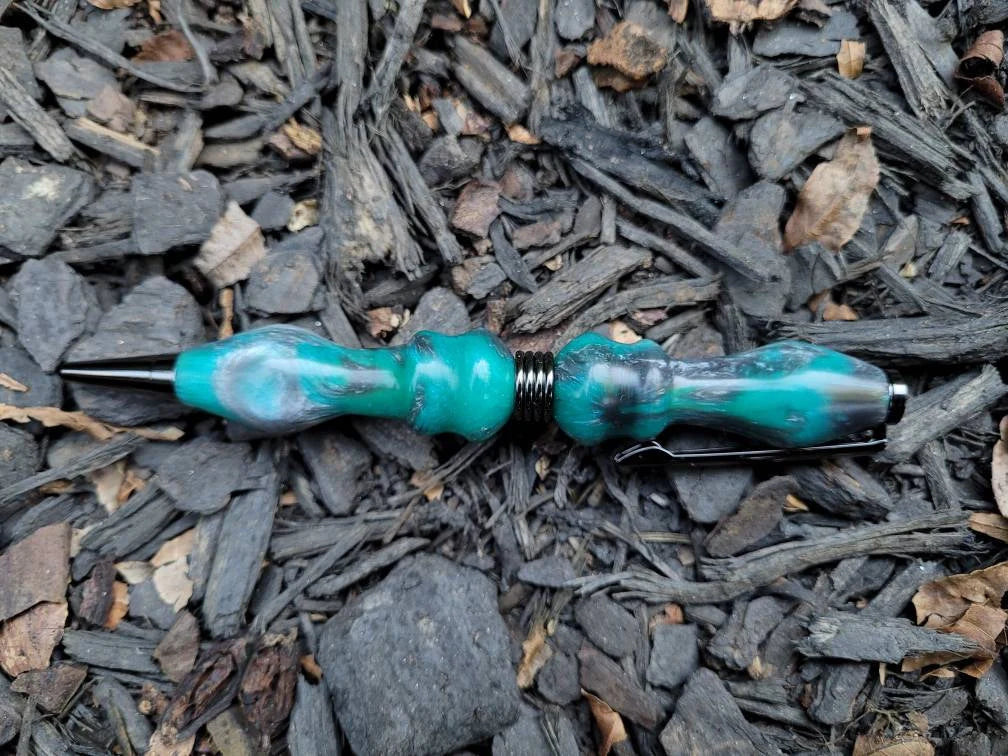 Smoke and Greenish Blue  Epoxy Resin Twist Pen with an Hint of Silver Chatoyancy.