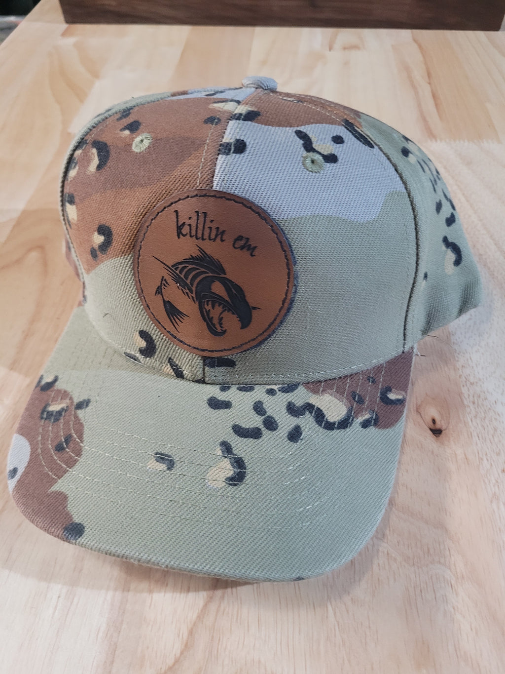 Desert Camo Ball Cap with fish skeleton "killin em" patch
