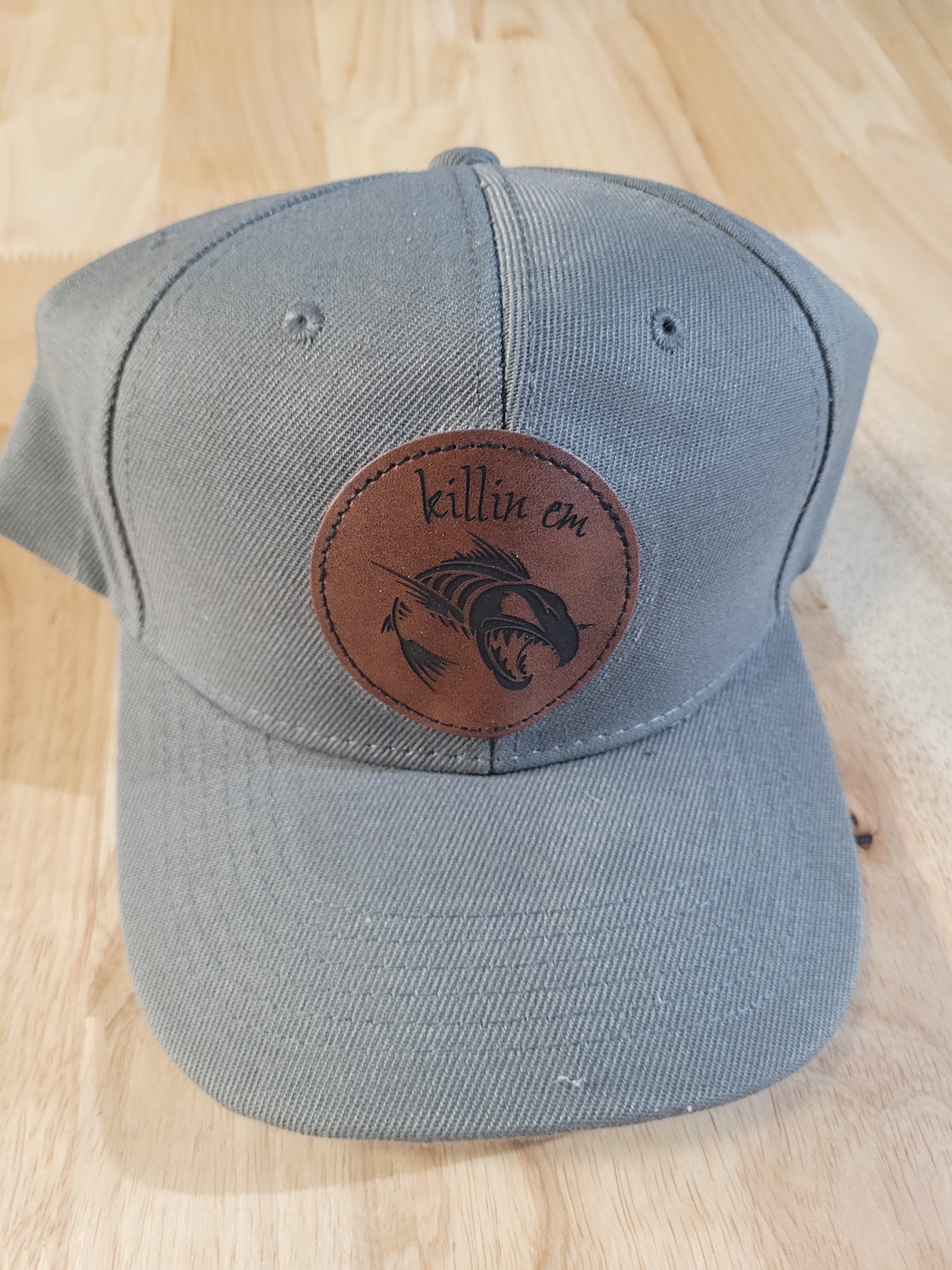 Gray Ball Cap with "killin em" engraved patch