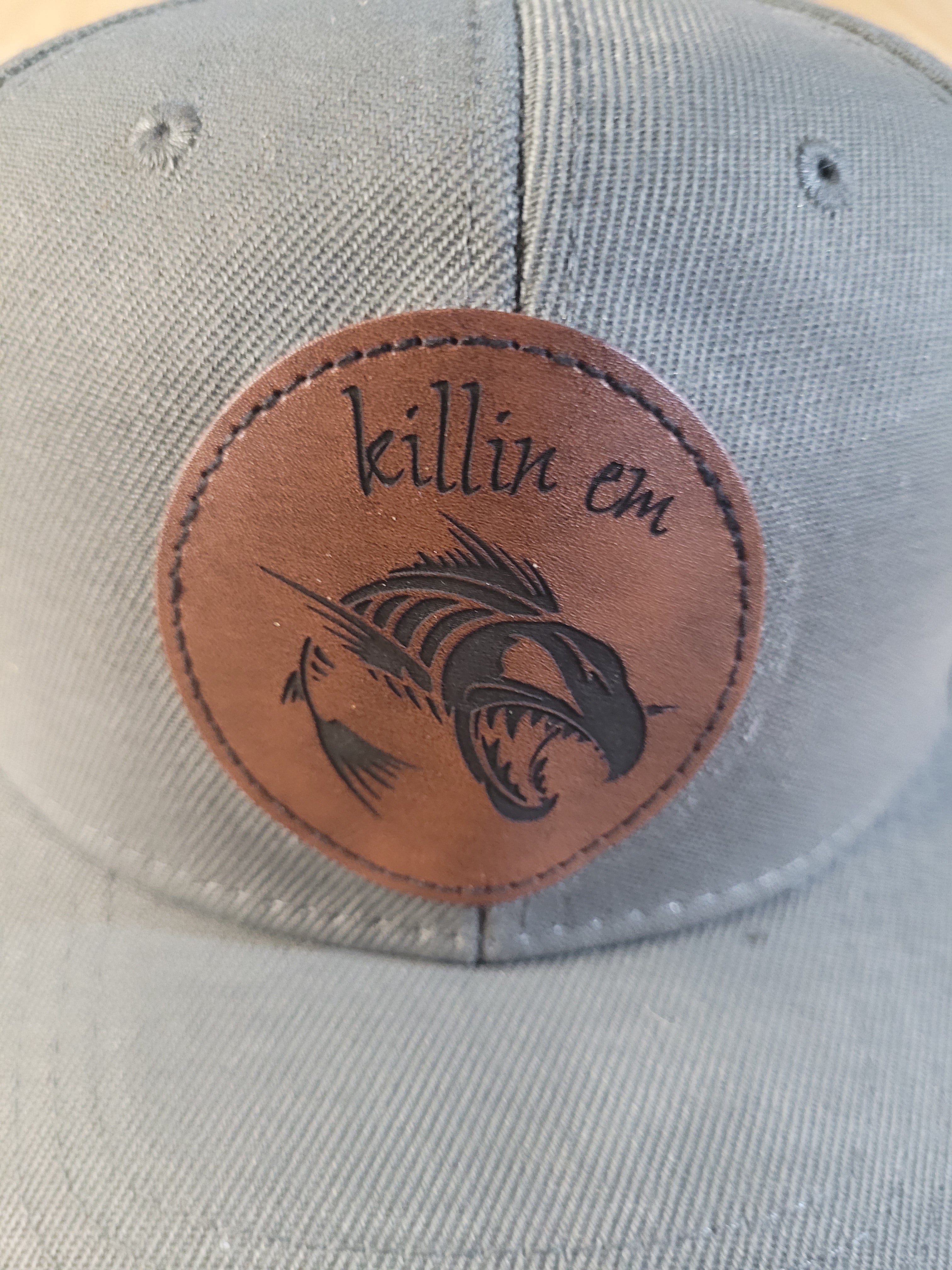 Gray Ball Cap with "killin em" engraved patch