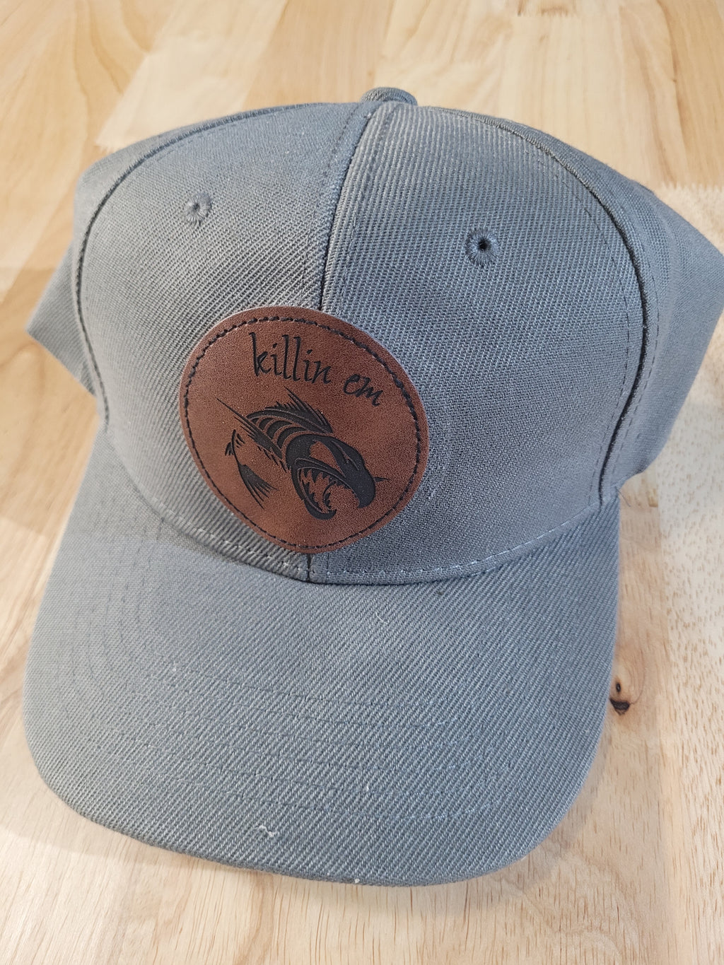 Gray Ball Cap with "killin em" engraved patch