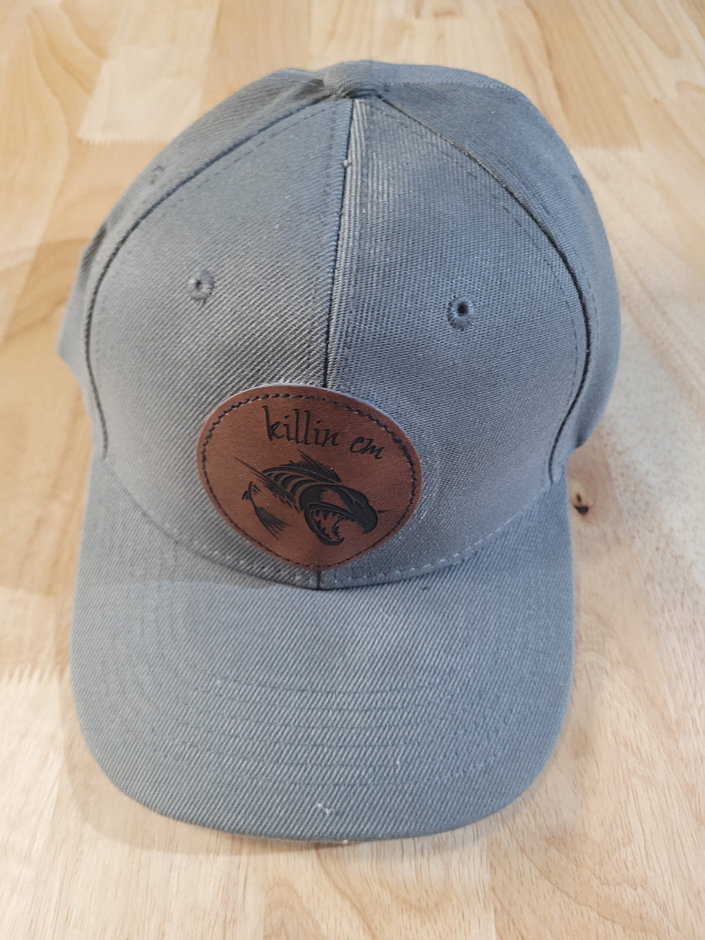 Gray Ball Cap with "killin em" engraved patch