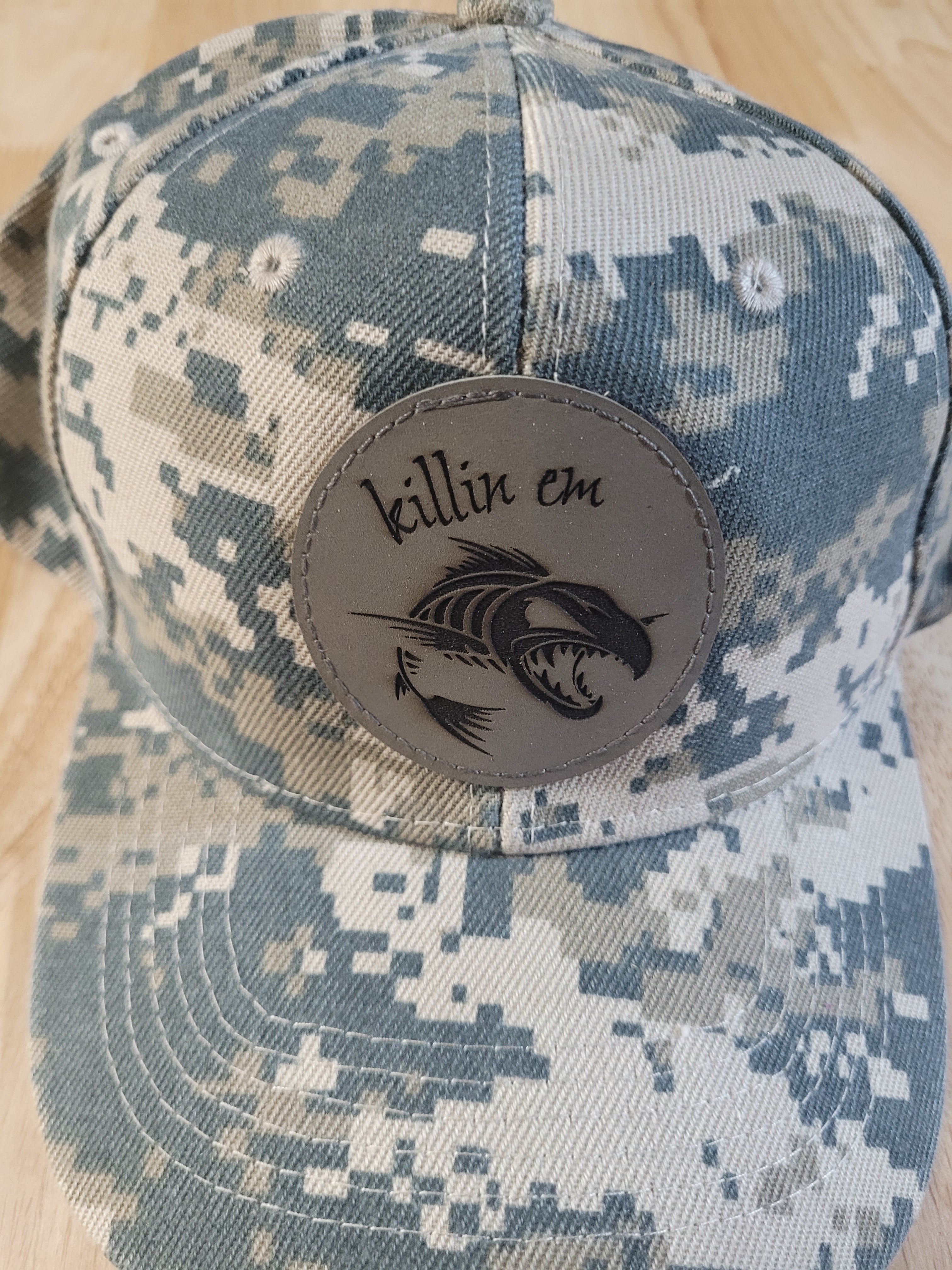 Digital Camo Ball Cap with a "killin em" fish skeleton patch