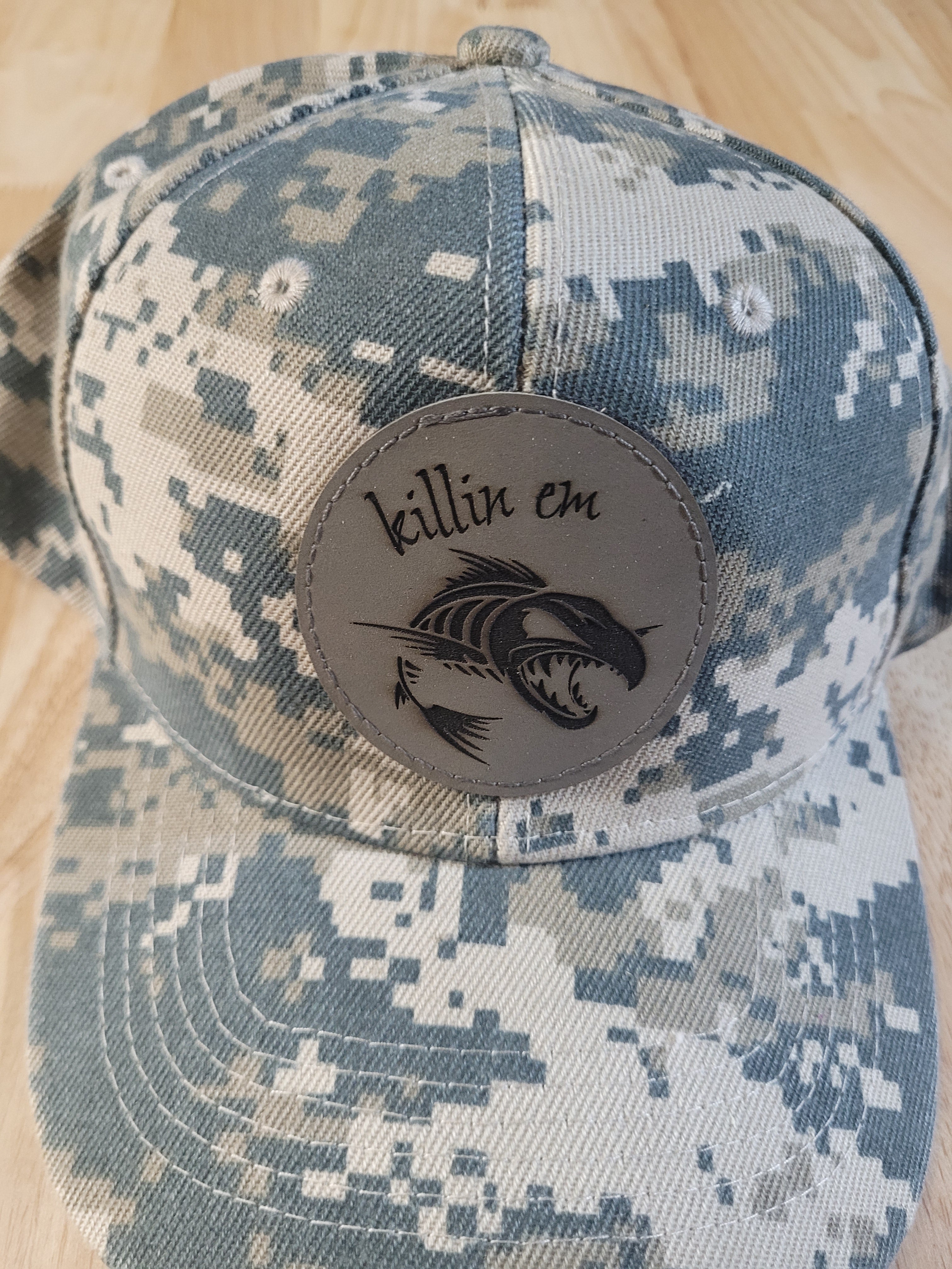 Digital Camo Ball Cap with a "killin em" fish skeleton patch