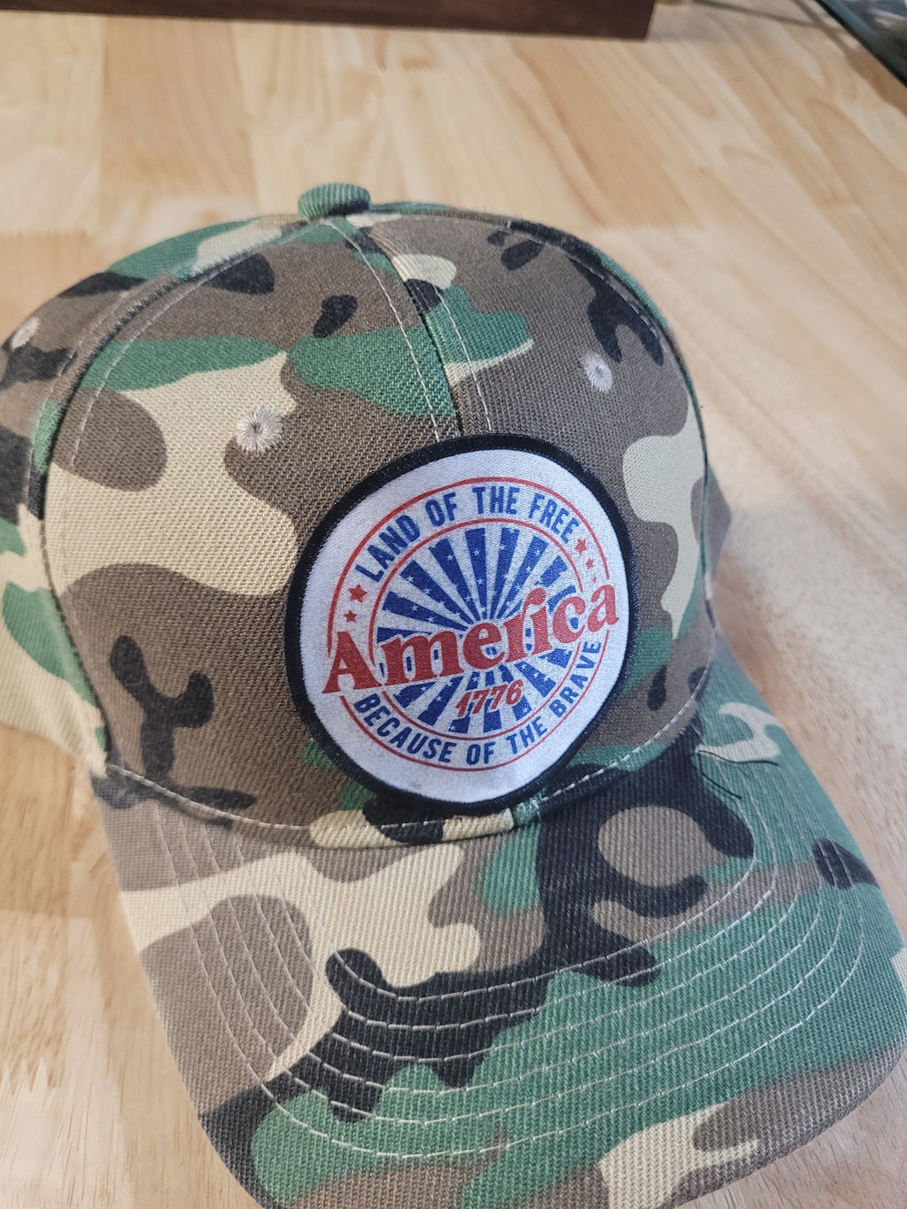 Camo Ball Cap with "America 1776 Land of the Free Because of the Brave"
