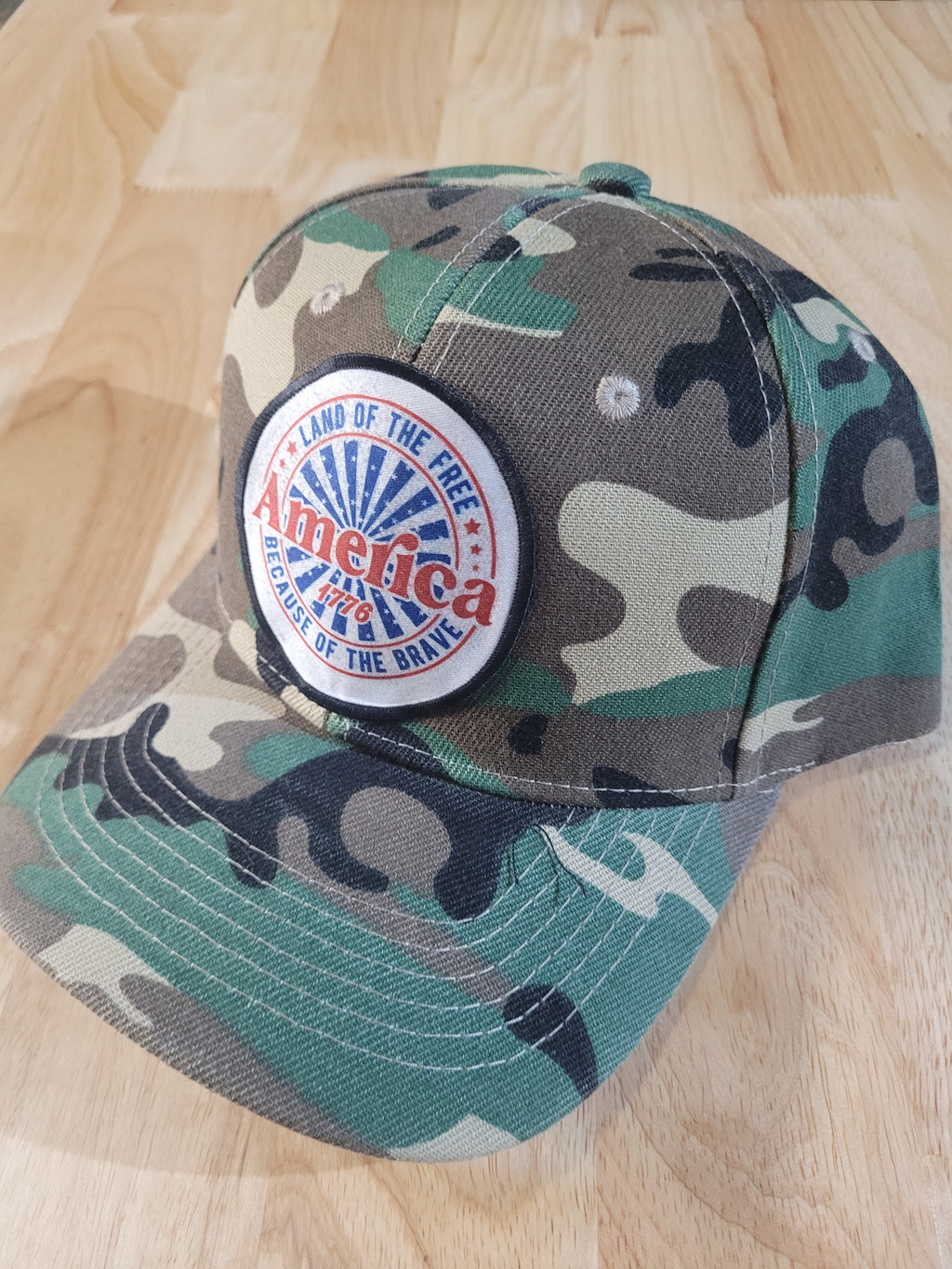 Camo Ball Cap with "America 1776 Land of the Free Because of the Brave"