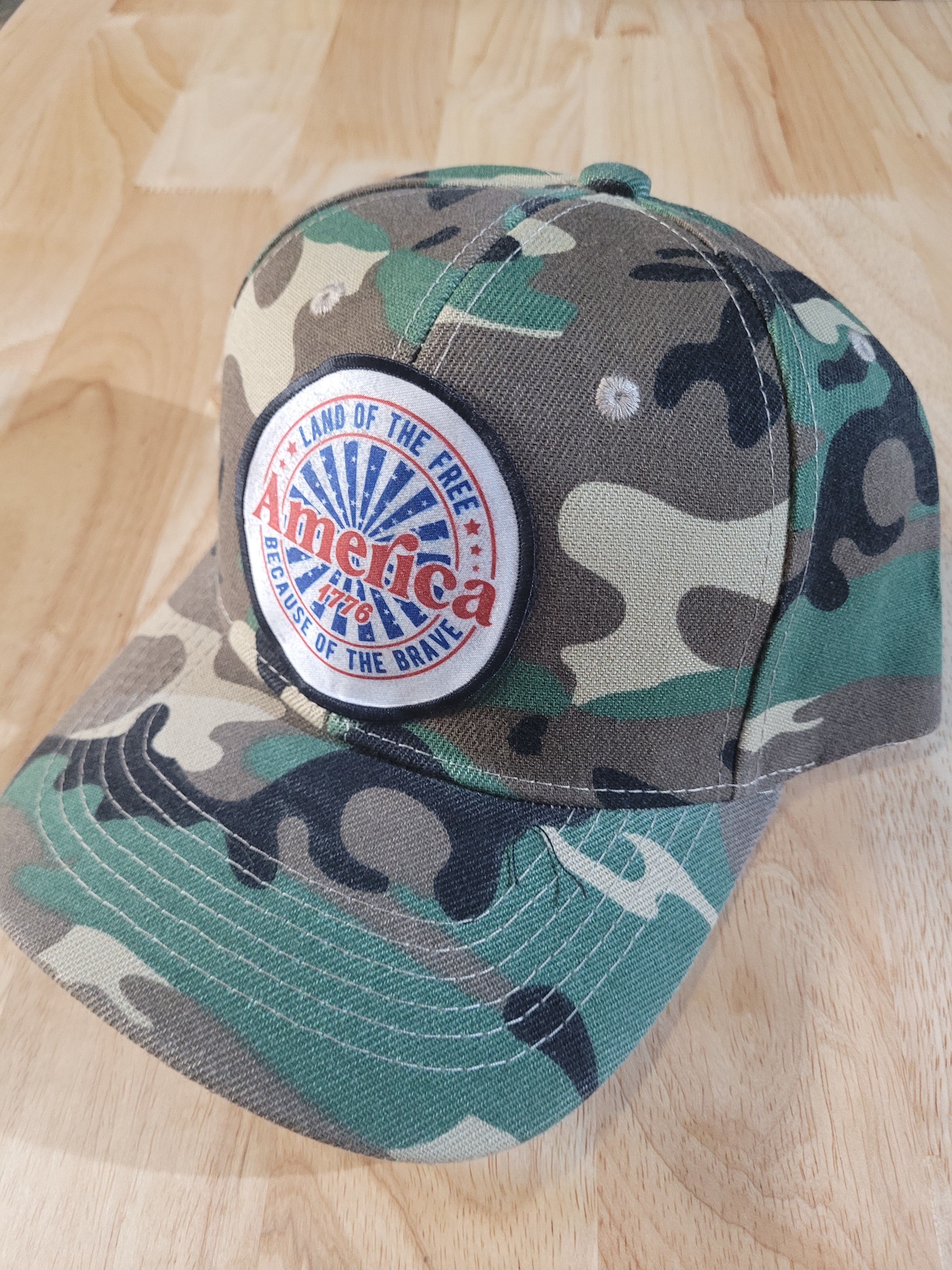 Camo Ball Cap with "America 1776 Land of the Free Because of the Brave"