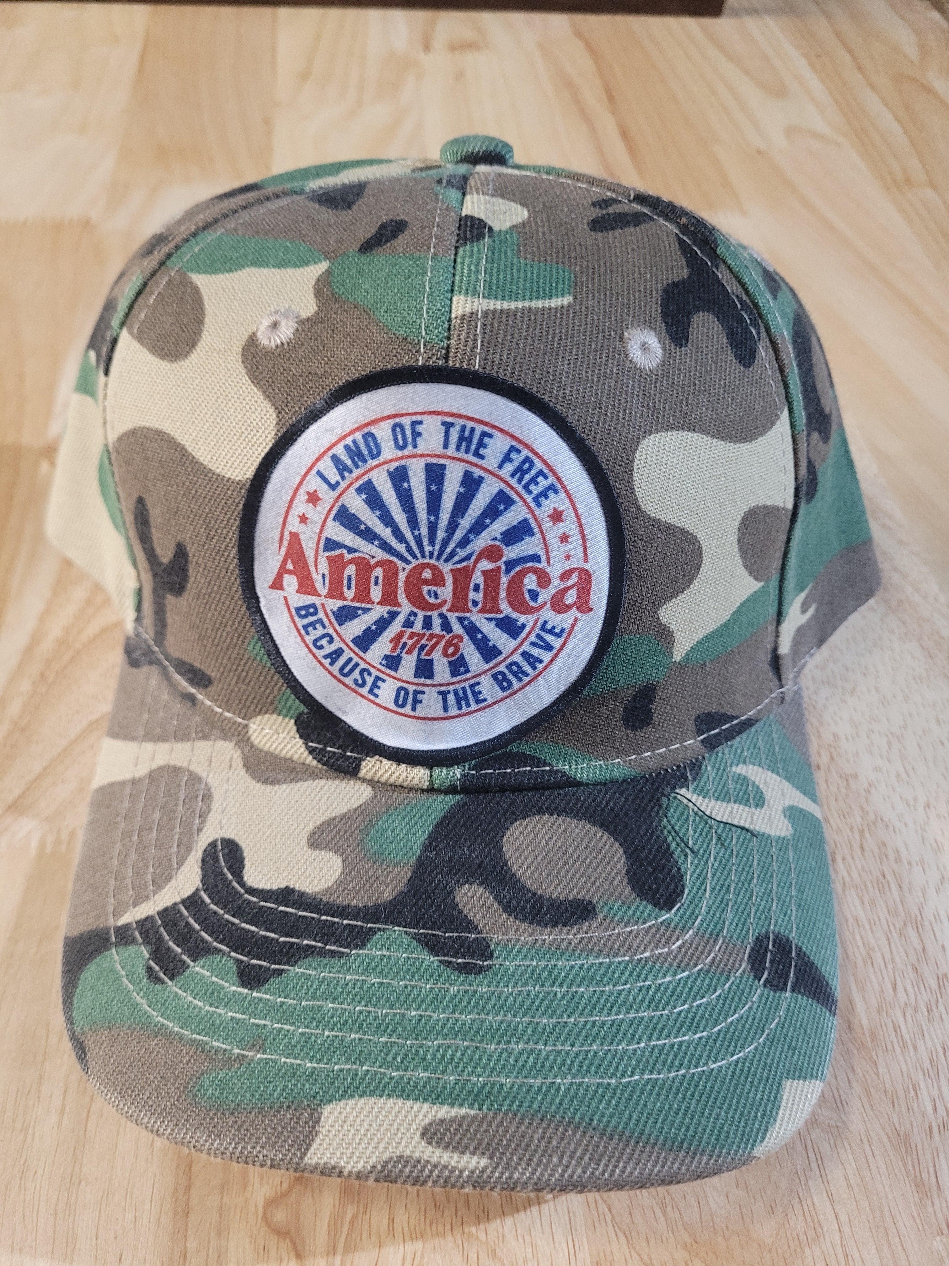 Camo Ball Cap with "America 1776 Land of the Free Because of the Brave"