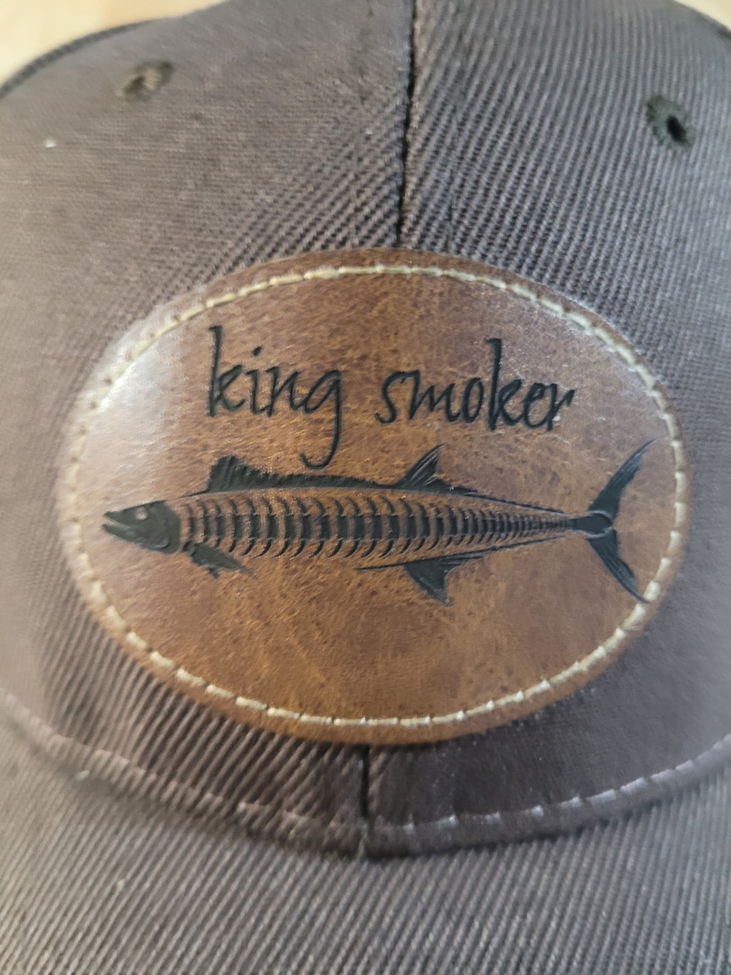 "King Smoker"  Brown Ball Cap with a  King Mackerel Fish Skeleton