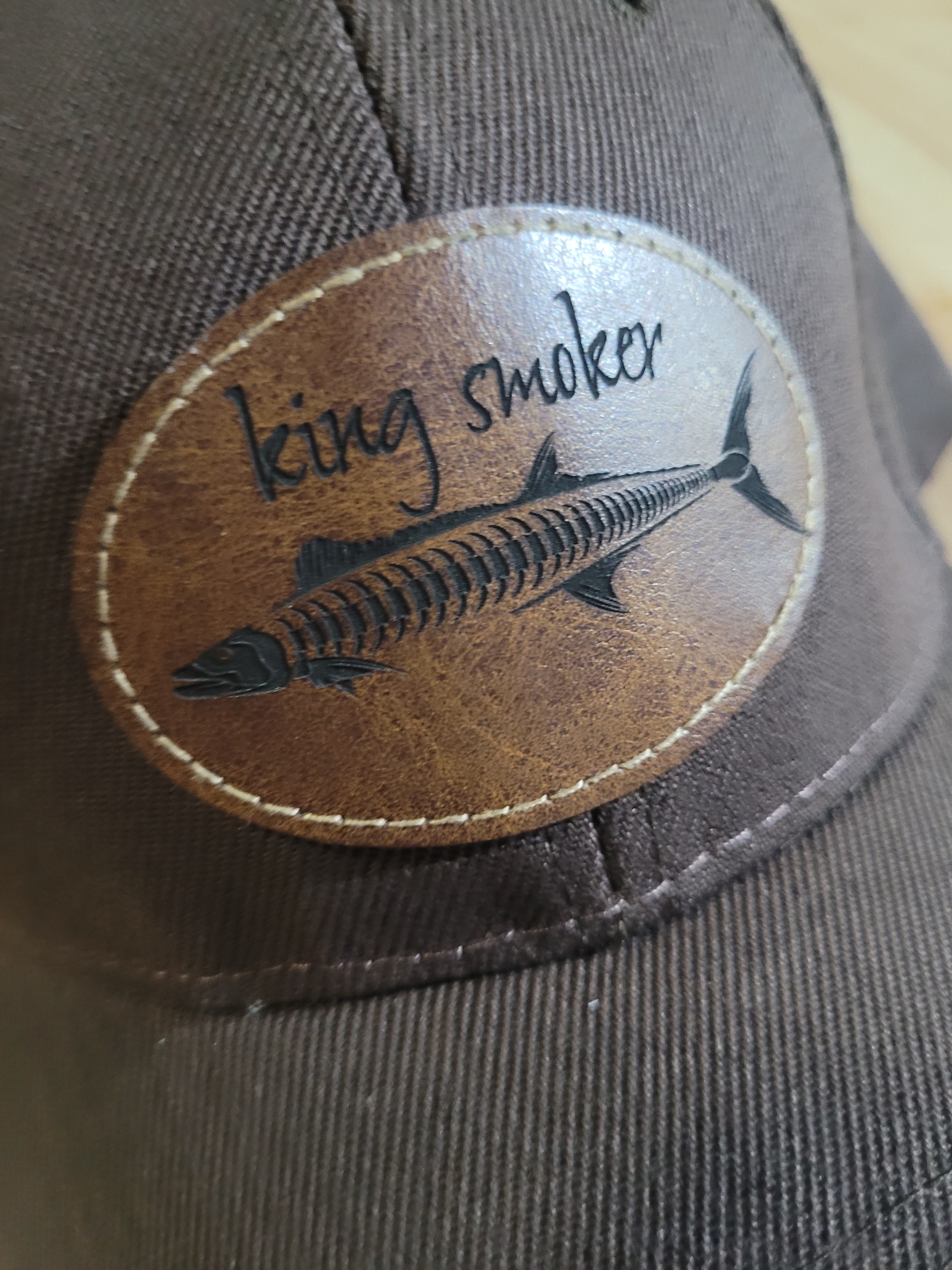 "King Smoker"  Brown Ball Cap with a  King Mackerel Fish Skeleton
