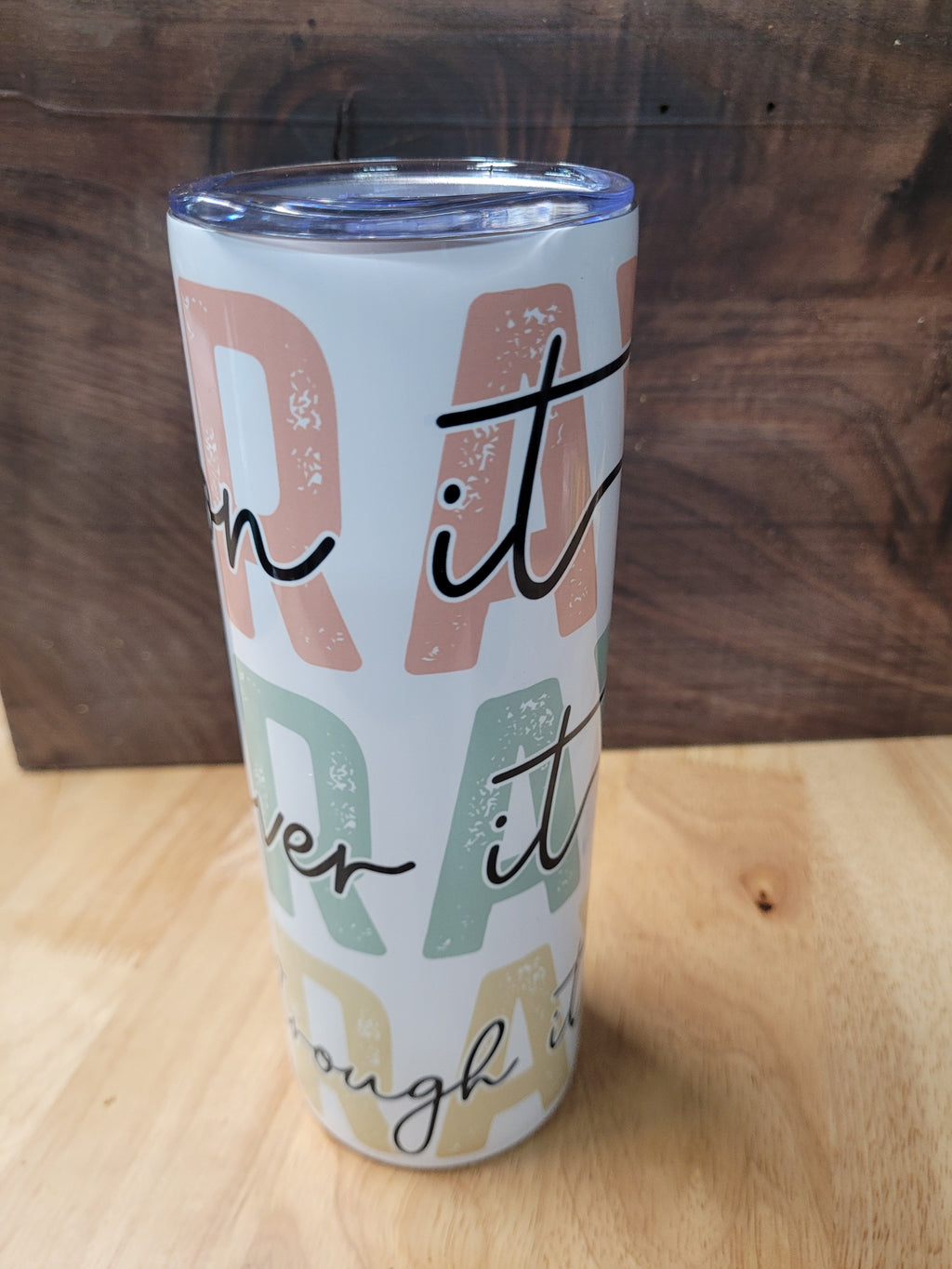 20 oz. Tumbler with "Pray on it, over it, and throw it"