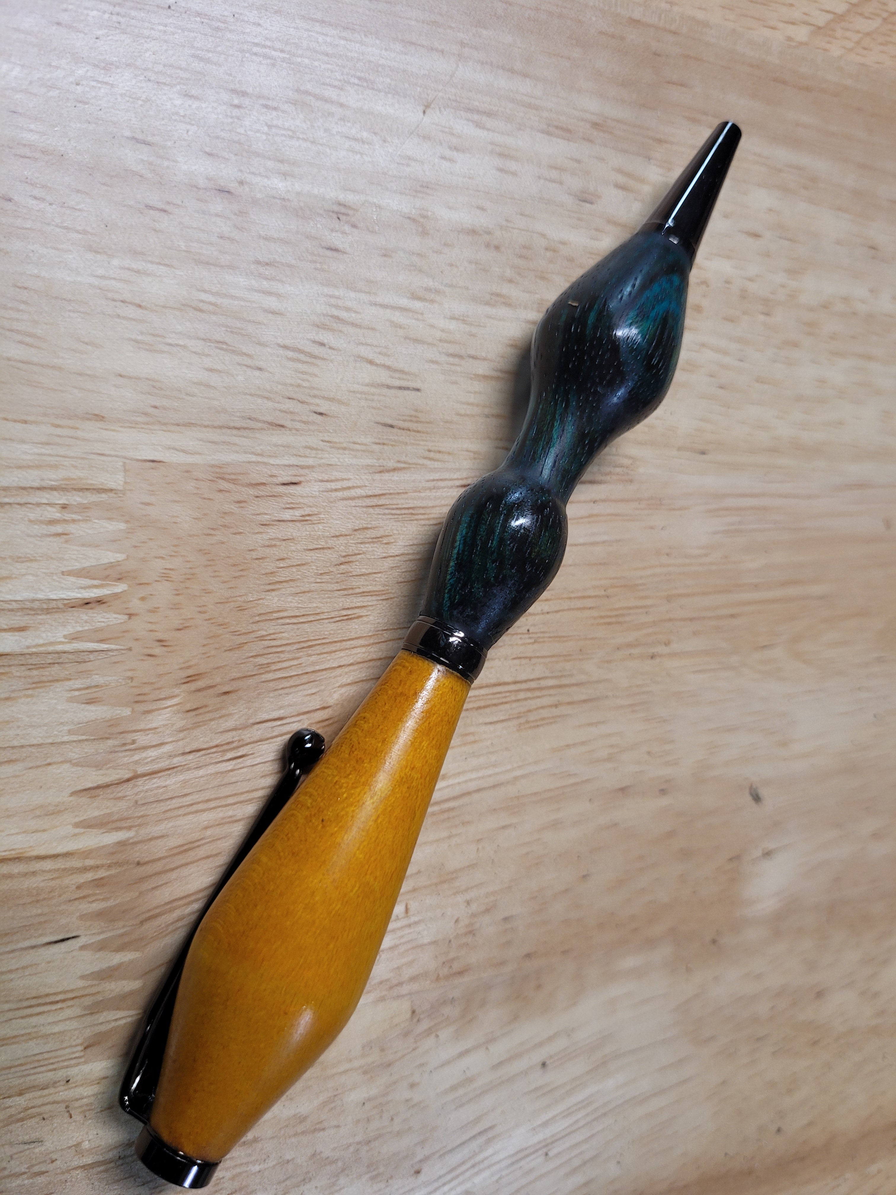 Twist Pen made of  Maple wood dyed Yellow top and Zebrawood dyed bluish green bottom