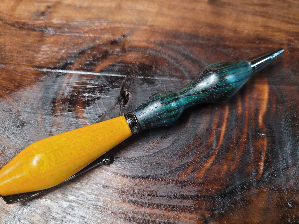 Twist Pen made of  Maple wood dyed Yellow top and Zebrawood dyed bluish green bottom