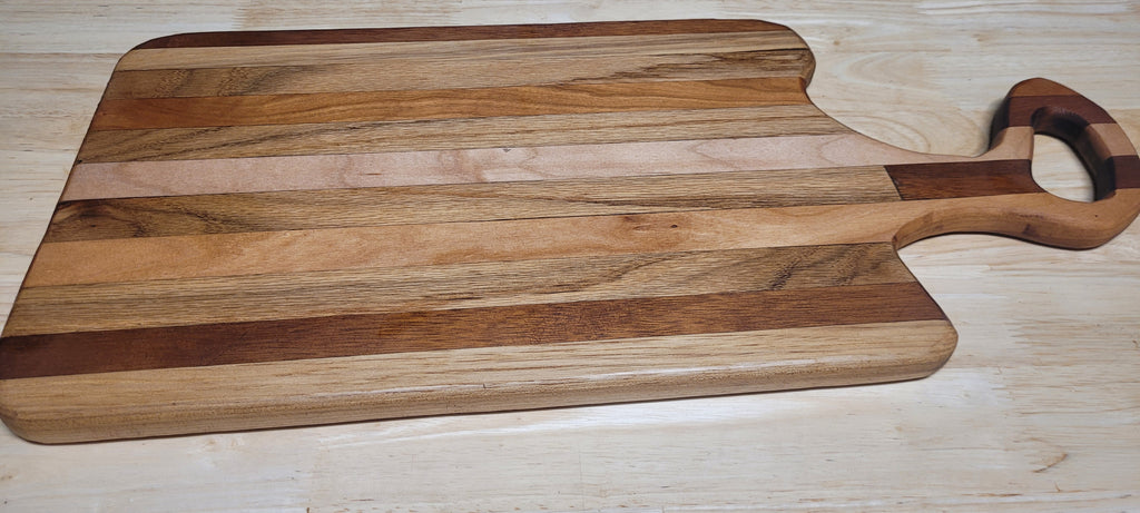 Multi Wood Charcuterie Board Oak, Maple, and Mahogany woods Approximately 19.5"L X 9.5"W